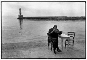 Photo © Constantine Manos/Magnum Photos Crete. Chania. 1962. Man reading newspaper.